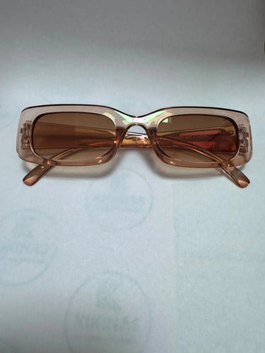 Lentes De Sol Marrón Diseño Rectangular Chico Kikinas Rectangular Ámbar Ambar Transparente Transparent Amber