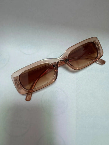 Lentes De Sol Marrón Diseño Rectangular Chico Kikinas Rectangular Ámbar Ambar Transparente Transparent Amber